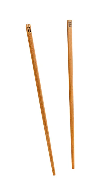 Par de palillos de madera sobre fondo blanco — Foto de Stock
