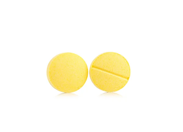 Yellow tablet for patient on white background — Stock Photo, Image