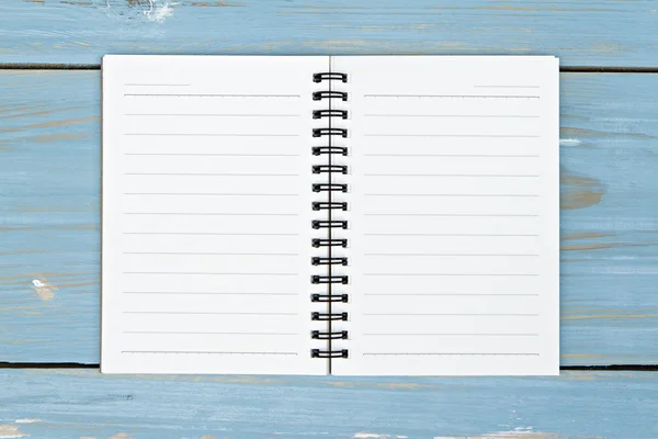 Notebook on wooden background. — Stock Photo, Image
