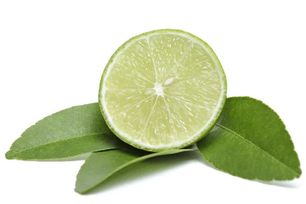 Slices of lime with leaves isolated on white background — Stock Photo, Image