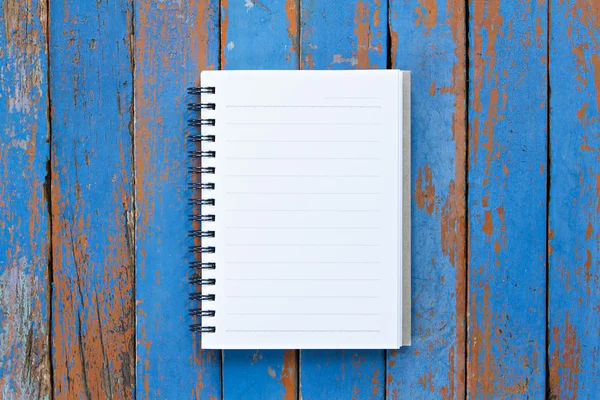 Page of notebook on wooden background. — Stock Photo, Image