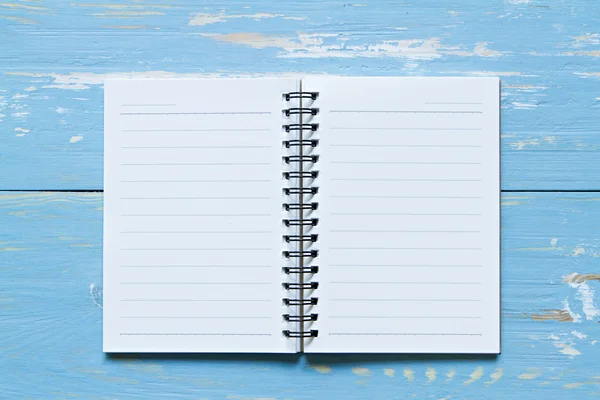 Page of notebook on wooden background. — Stock Photo, Image