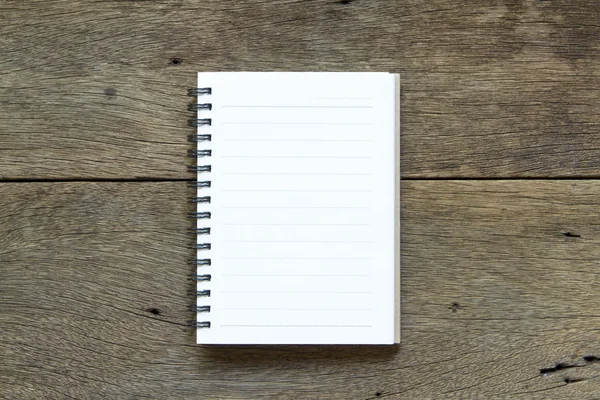 Page of notebook on wooden background. — Stock Photo, Image
