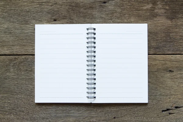 Page of notebook on wooden background. — Stock Photo, Image