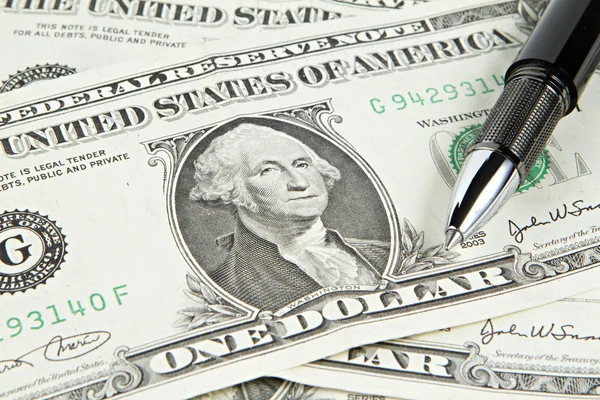 Dólar com caneta preta — Fotografia de Stock