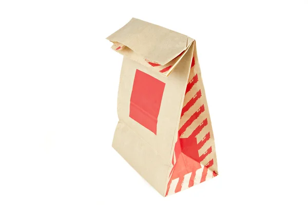 Brown paper bag on isolated white — Stock Photo, Image