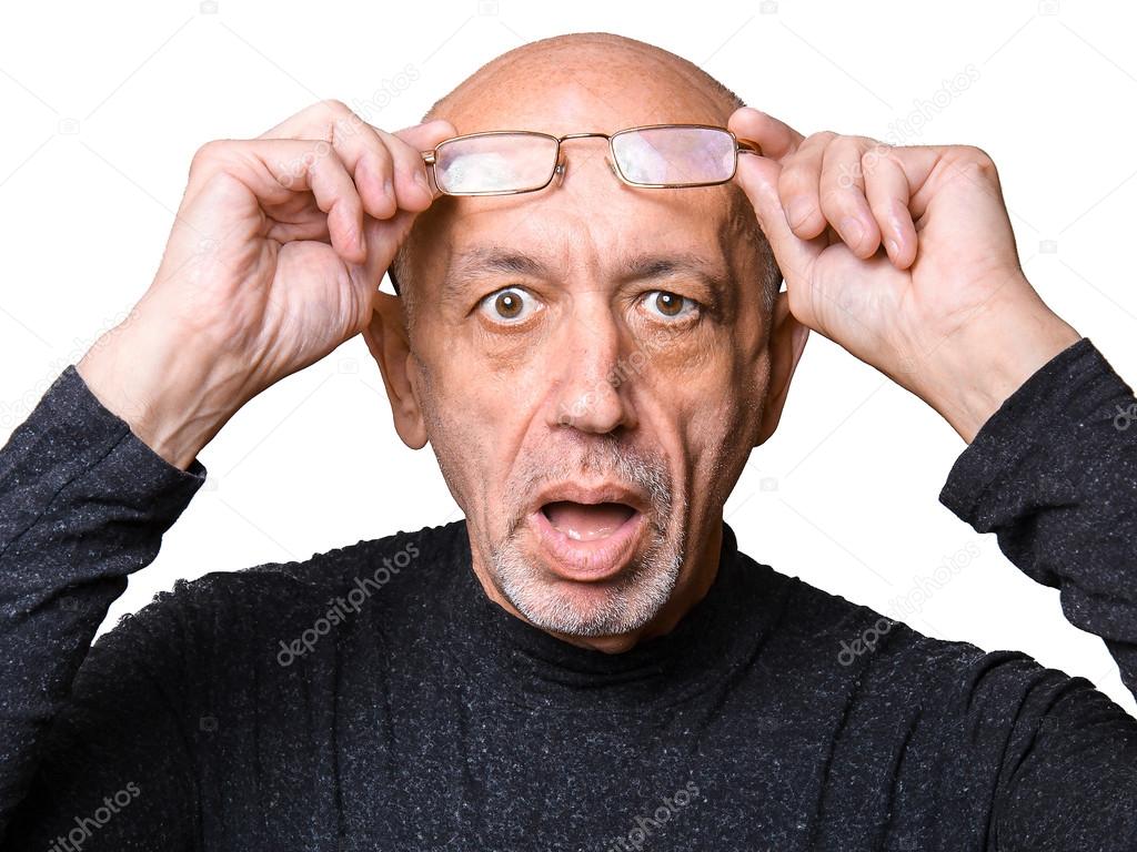 Senior, elderly man in glasses, looking shocked, open mouth isolated on white background