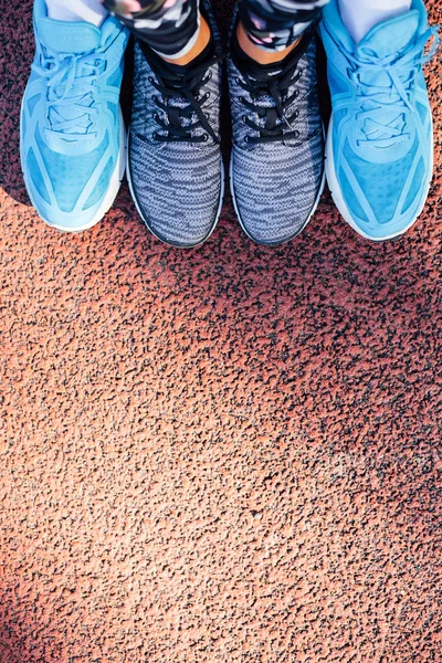 Woman and man sport shoes together