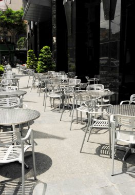 Empty tables and chairs clipart