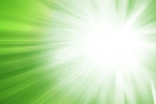 Strălucire verde strălucire raze defocalizate lumini fundal abstract . — Fotografie, imagine de stoc