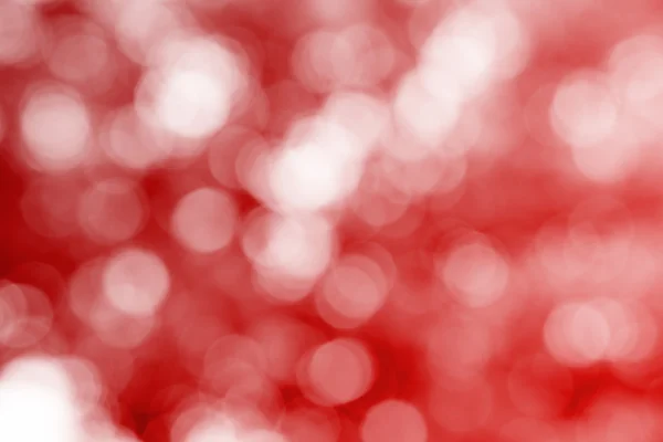 Kırmızı parlak defocused ışıltı ışınları ışıklar bokeh
