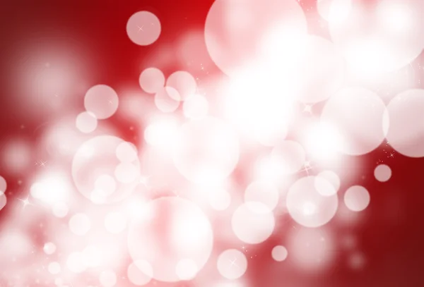 Kırmızı parlak defocused ışıltı ışınları ışıklar bokeh