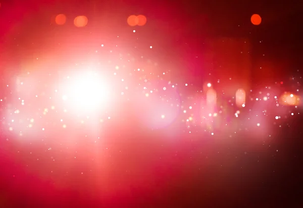 Defocused kırmızı ışın ışıklar bokeh glitter