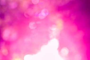 Pembe glitter ışıltı ışınları ışıklar defocused