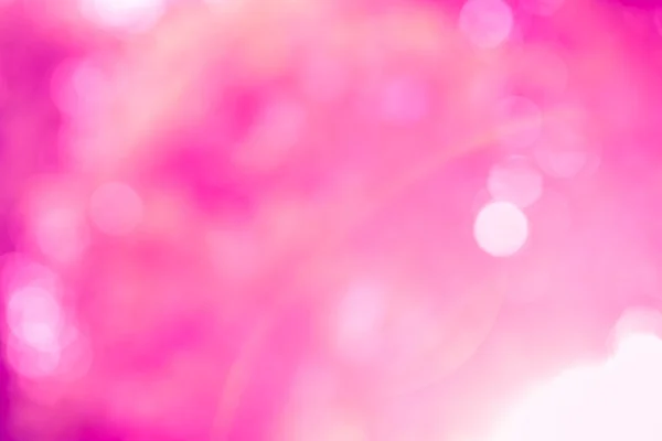 Pink glitter sparkle defocused rays lights — Stock Photo, Image