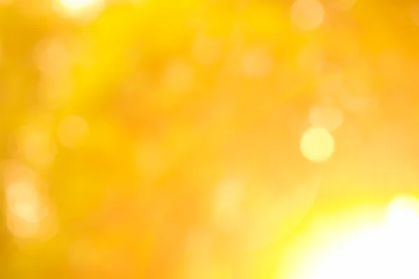 Brokat złoty blask niewyraźne promienie światła bokeh streszczenie — Zdjęcie stockowe