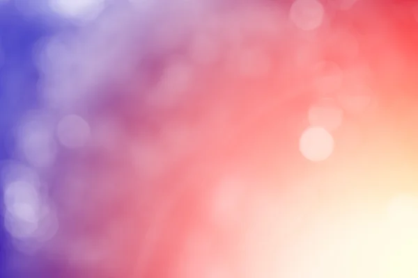 Kırmızı ve mor glitter ışıltı ışınları ışıklar bokeh defocused