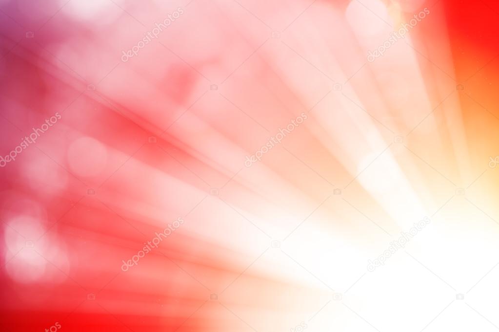 Red glitter sparkle defocused rays lights bokeh