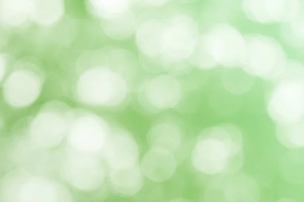 Gröna bokeh glitter defocused lampor — Stockfoto
