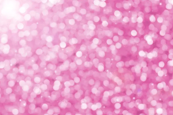 Pink glitter sparkle defocused rays lights bokeh — Stock Photo, Image