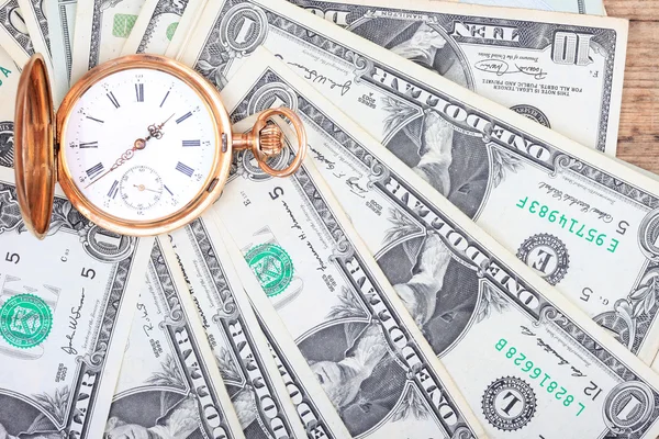 Reloj y billetes de dólar fondo — Foto de Stock