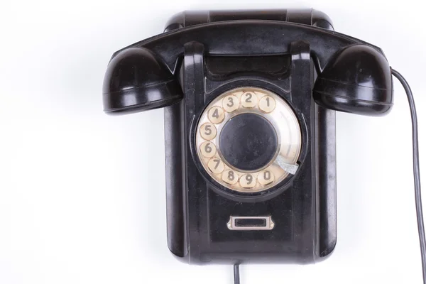 Vecchio telefono primo piano isolato su sfondo bianco — Foto Stock