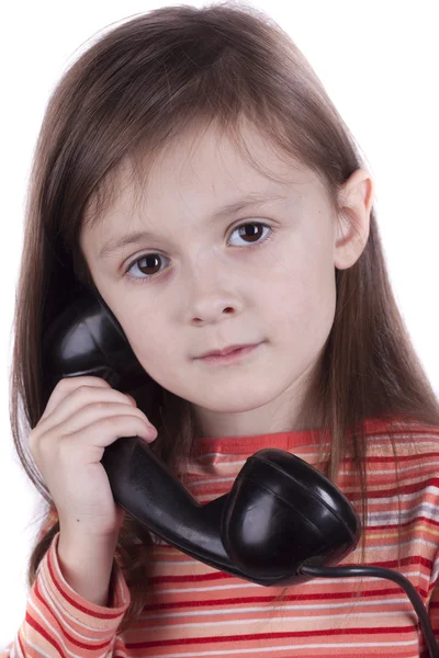 Ernstige triest kind praten over telefoon, witte achtergrond — Stockfoto