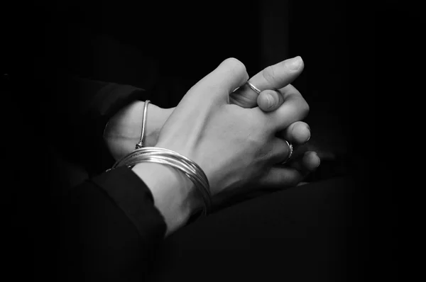 Woman hands clasped as in a prayer — Stock Photo, Image