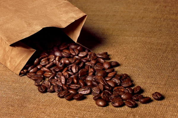 coffee beans in kraft paper on the Table