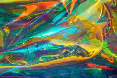 Soyut gökkuşağı arkaplanı. Şenlikli holografik kurdelenin duvar kağıdı görüntüsü, tasarımın için iyi bir fikir..