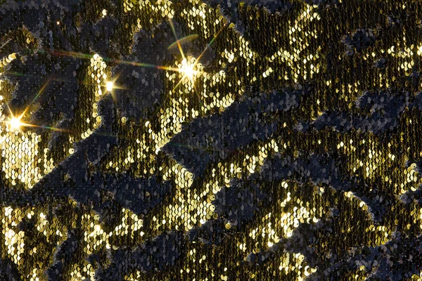 Žluté Kovové Flitry Pozadí Textilní Pozadí Černými Zlatými Duhovými Flitry — Stock fotografie