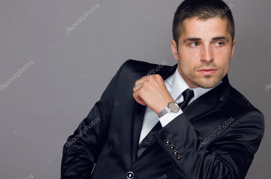 Handsome young man wears a watch Stock Photo by ©andre2013 85230248