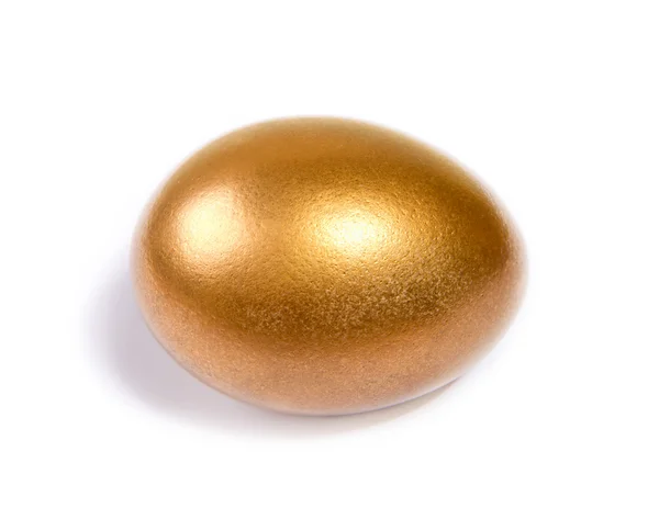 Ovos de Páscoa dourados em branco — Fotografia de Stock
