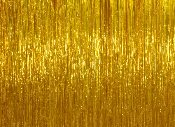 Golden Christmas tinsel background — Stock Photo, Image