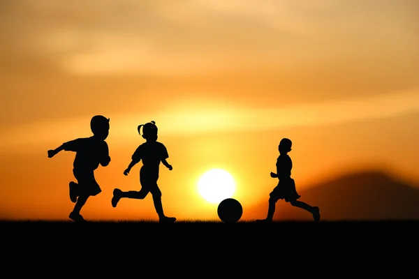 The kids play a  footbal — Stock Photo, Image