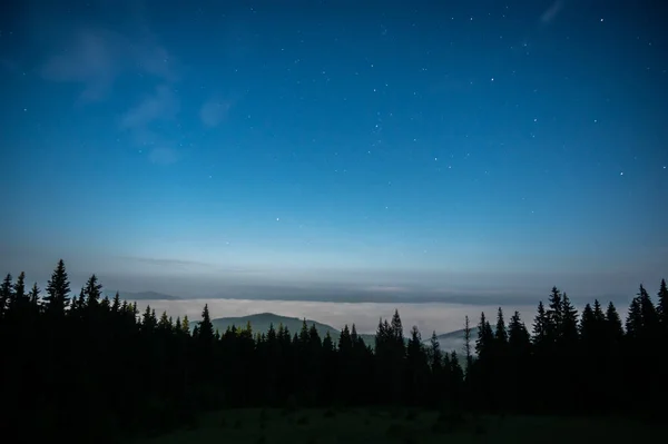 stock image Moon and starry night in the Carpathians