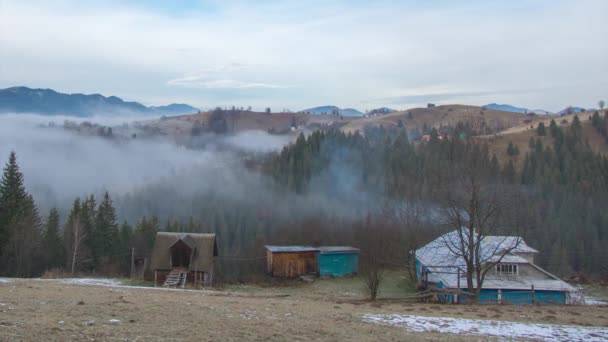 Timelapse, fog over the forest and the house in the Carpathian mountains — Stock Video