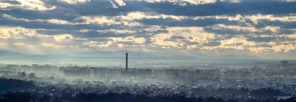 Panorama of the city of Ivano-Frankivsk in the haze on a winter day