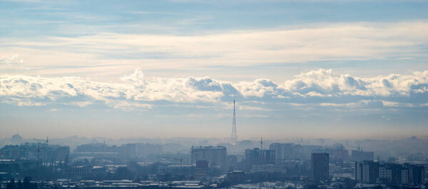 Panorama of the city of Ivano-Frankivsk in the haze on a winter day