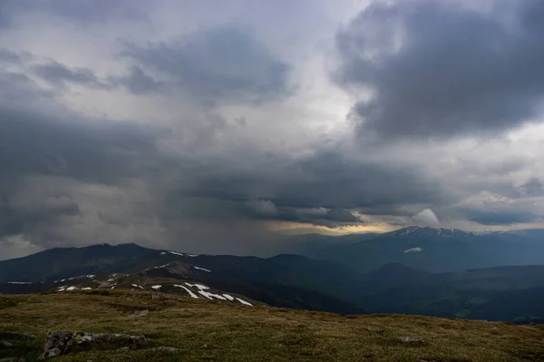 Rain cloud and rain wall in the carpathian mountains in summer