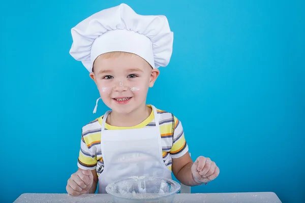 The young chef, pastry chef dressed in  clothes chef — Stock Photo, Image