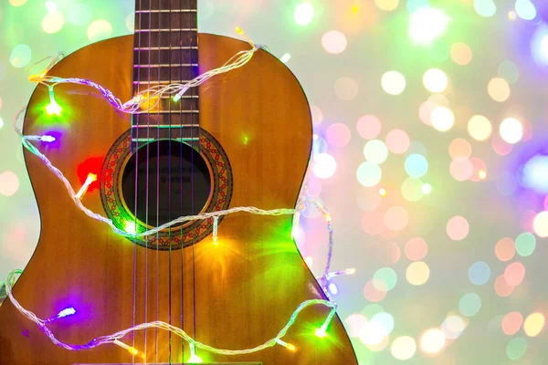 Acoustic Guitar Wrapped Colorful Garland Bokeh Christmas New Year Music — Stock Photo, Image