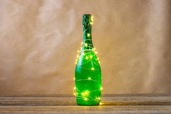 Bottle Green Champagne Wrapped Glowing Garland Christmas Tree New Year — Stock Photo, Image