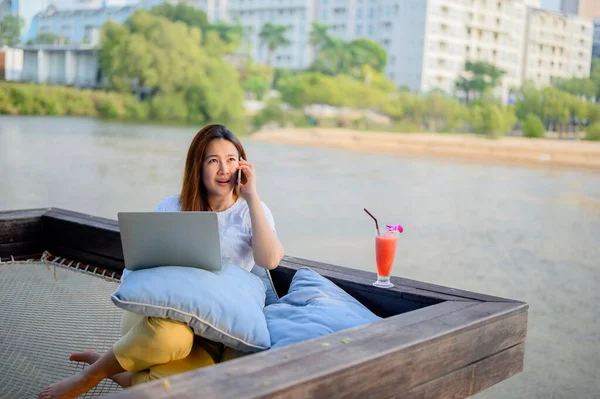 Asian Businesswoman Working Online Beach Freelancer Using Technology Work Everywhere Stock Photo