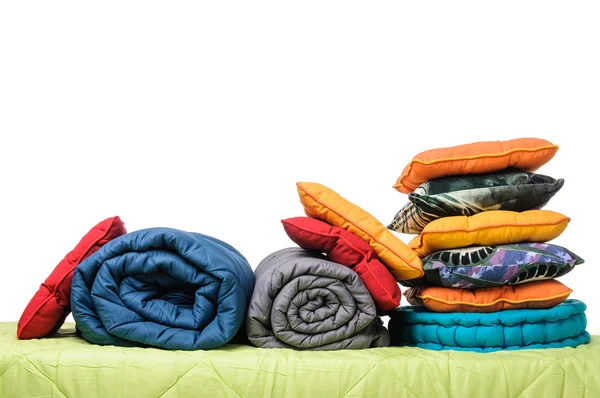 Textiles, almohadas, mantas se encuentra en el colchón Fotos de stock libres de derechos