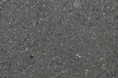 Siyah renk desenli düz asfalt yol dokusu, üst görünüm arkaplan.