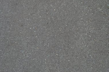 Siyah renk desenli düz asfalt yol dokusu, üst görünüm arkaplan.