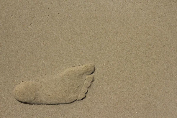 Υφή Πατημασιών Στην Άμμο Στην Παραλία Την Ώρα Του Ηλιοβασιλέματος — Φωτογραφία Αρχείου