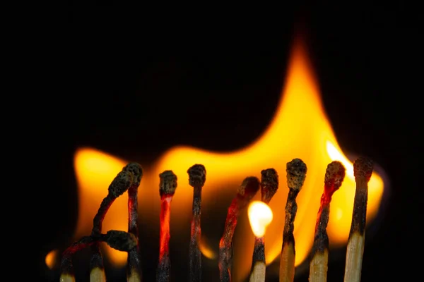 Group Red Match Burning Isolated Black Background Row Burning Chain — Stock Photo, Image