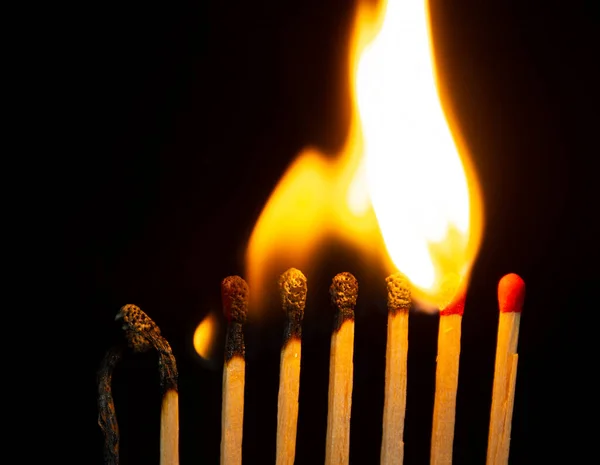 Group Red Match Burning Isolated Black Background Row Burning Chain — Stock Photo, Image